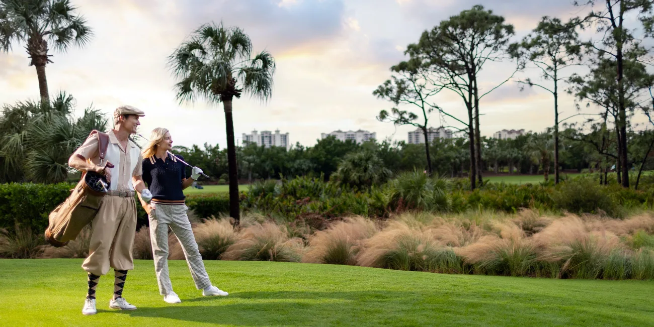 A couple enjoying golf at The Colony, Bonita Springs